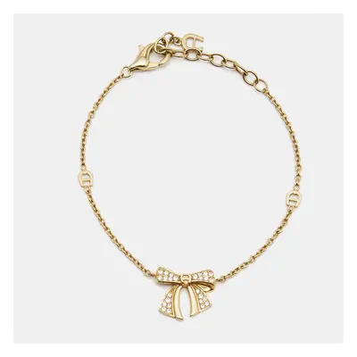 Aigner Bow Crystals Gold Tone Bracelet