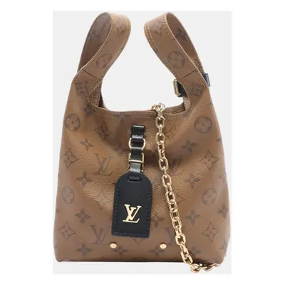 Louis Vuitton Atlantis Bb Coated Canvas Leather Monogram Reverse Brown Handbag