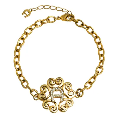 Aigner Gold Tone Crystal Logo Bracelet