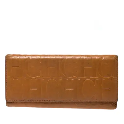 CH Carolina Herrera Mustard Monogram Embossed Leather Trifold Continental Wallet