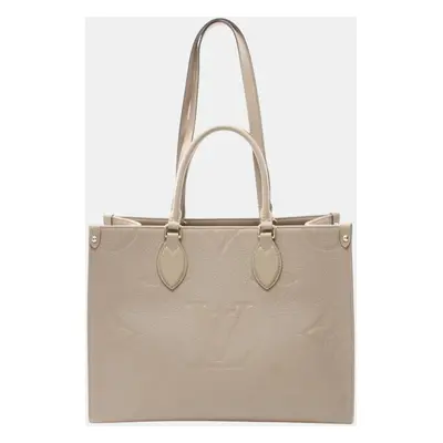 Louis Vuitton Leather Monogram Empreinte Beige On The Go Mm Tote Bag