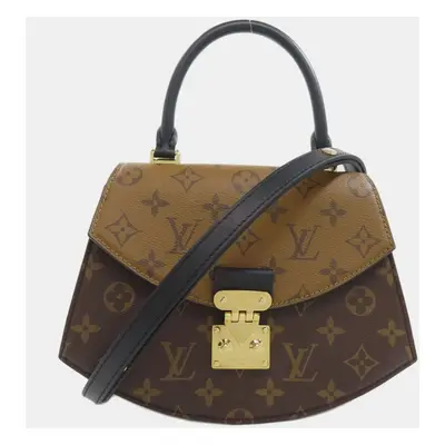 Louis Vuitton Monogram Reverse Tilsitt Handbag