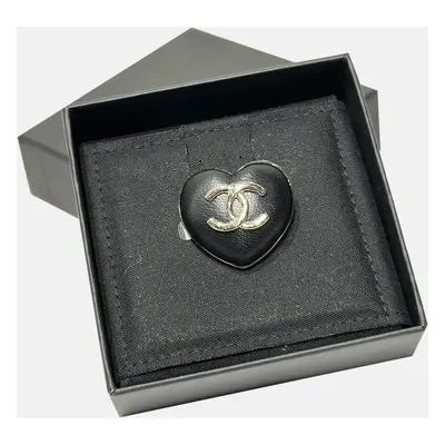 Chanel 22K black leather love brooch