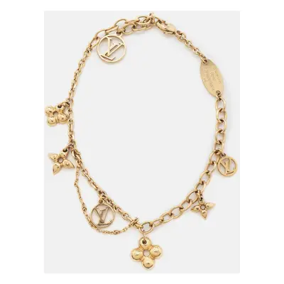 Louis Vuitton Blooming Supple Gold Tone Charm Bracelet