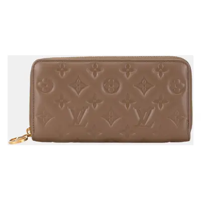 Louis Vuitton Beige Leather Monogram Zippy Wallet