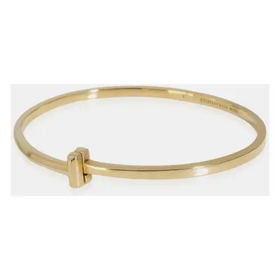 Tiffany & Co. 18K Yellow Gold T Narrow Hinged Bangle Bracelet