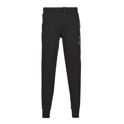 Tommy Hilfiger TOMMY LOGO SWEATPANTS men's Sportswear in Black