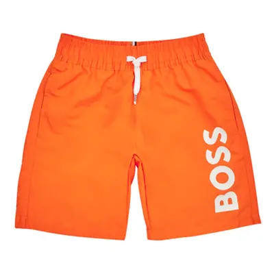 BOSS J24846-401-J boys's Children's shorts in Orange