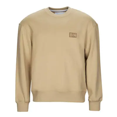 Calvin Klein Jeans SHRUNKEN BADGE CREW NECK men's Sweatshirt in Beige