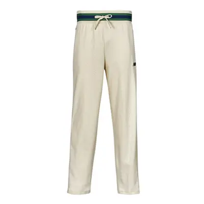 New Balance SGH BASKETBALL TRACK PANT men's Sportswear in Beige