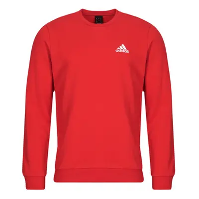 Adidas FEELCOZY ESSENTIALS FLEECE SWEATSHIRT men's Sweatshirt in Red