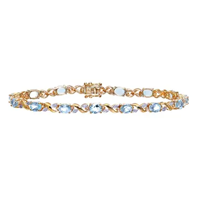 Jewelco London 9ct Yellow Gold Round 13pts Diamond Oval 5.81ct Blue Topaz Kiss Tennis Bracelet -