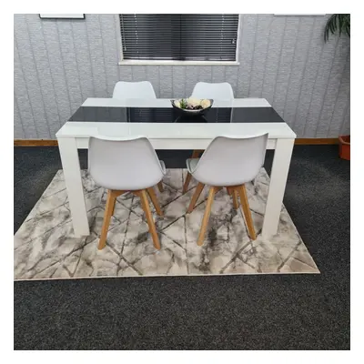 White Black Kitchen Dining Table and White Tulip Chairs