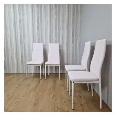 Four White Faux Leather Padded Chairs With Tint Of Pink