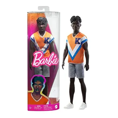 - Ken Fashionistas doll with twisted black hair and a trendy sporty jersey and shorts, HPF79