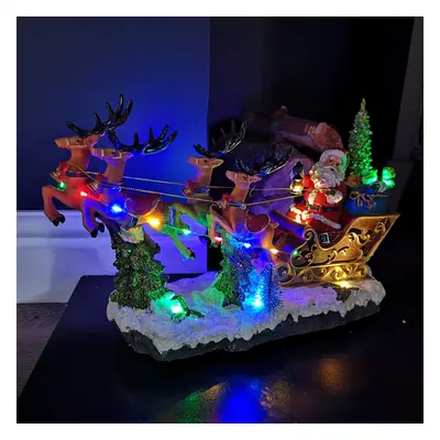 35cm Battery Operated LED Musical Santa Riding Sleigh with Turning Tree Christmas Decoration