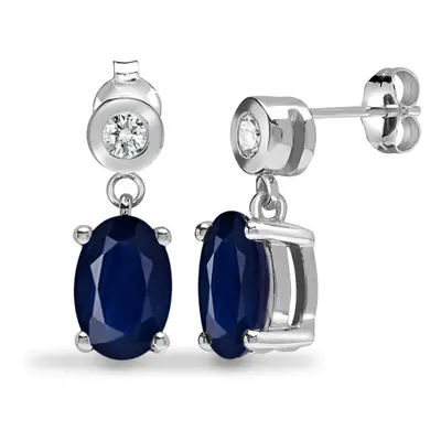 Jewelco London 9ct White Gold Rub Over Set H I1 0.07ct Diamond and Oval Blue 1.3ct Sapphire Soli