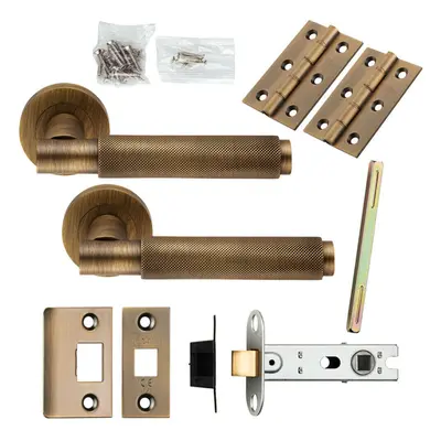 Door Handle & Latch Pack Antique Brass Knurled Round Bar Screwless Round Rose