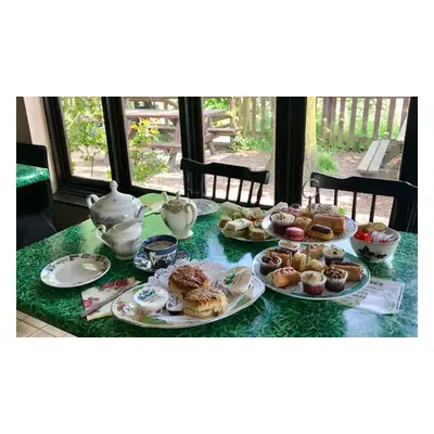 Afternoon tea and entrance to Eagle Heights for Four