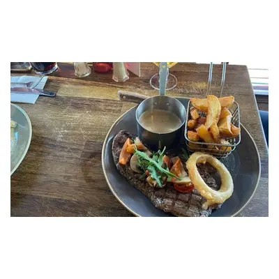 Rump steak meal with sauce and a side for two