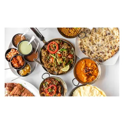 For four, two-course Indian meal with sides; valid Wednesday & Thursday