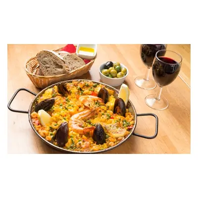 Choice of Paella olives Sangria beer or wine for two